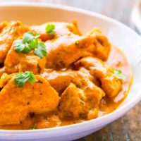 Traditional Indian Chicken Curry Dish Served in a Bowl.